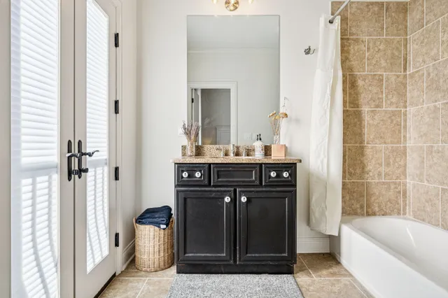 a room with furniture and a flat screen tv