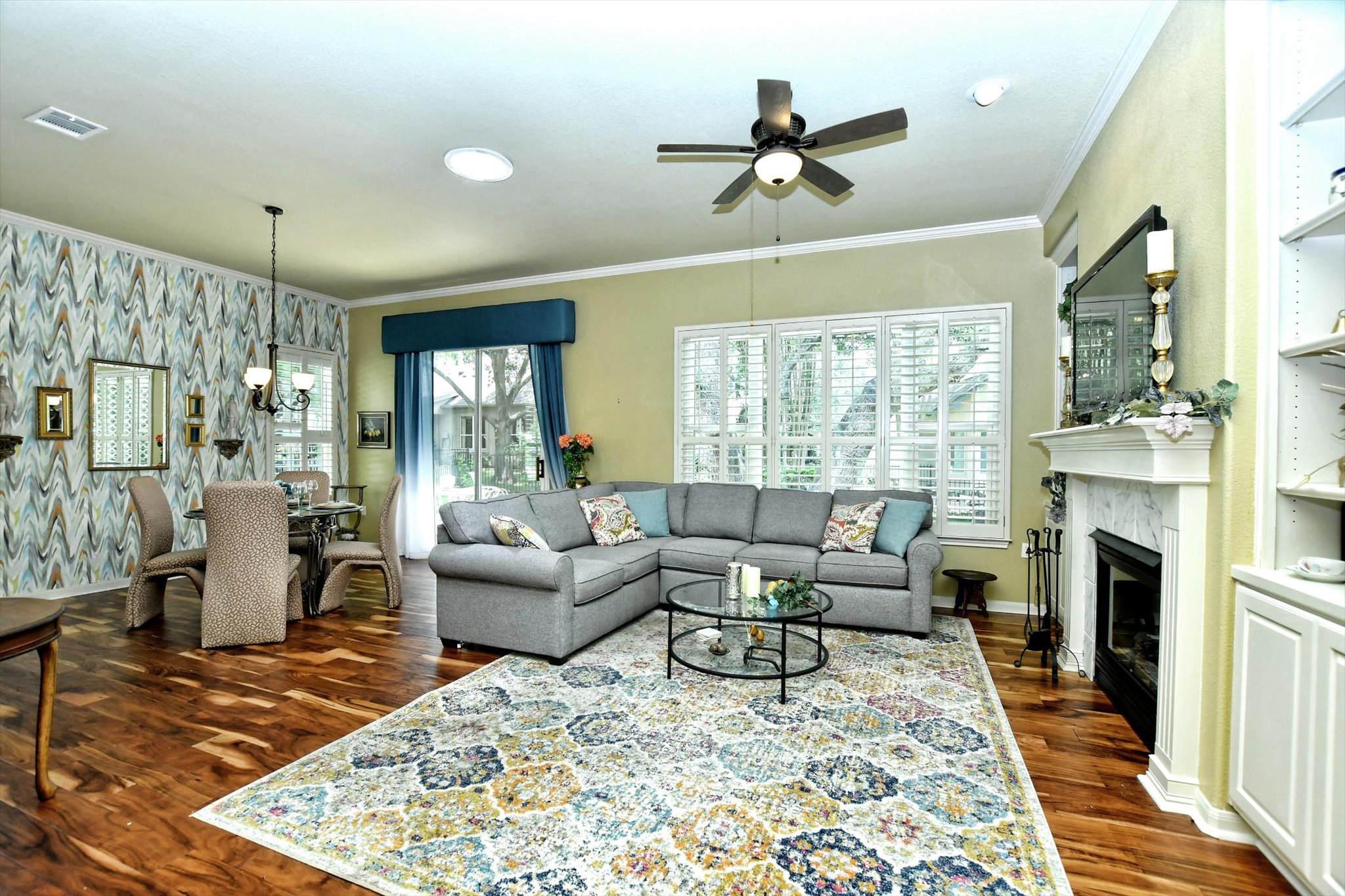 106 Nighthawk Way Georgetown, TX 78633 - Photo 6 of 29 Hardwood floors and a cozy fireplace define this inviting living area, perfect for entertaining.