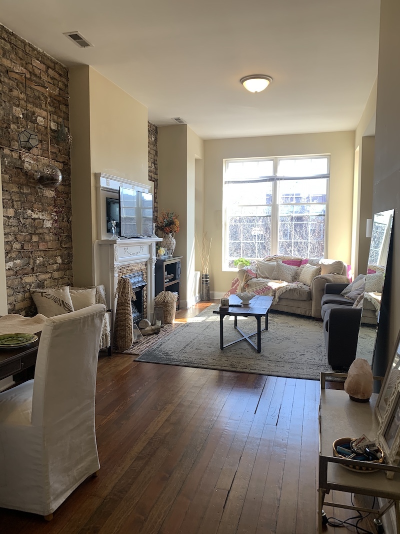 1740 West Huron Street, Unit 3F Chicago, IL 60622 - Photo 2 of 18 a living room with furniture and a fireplace