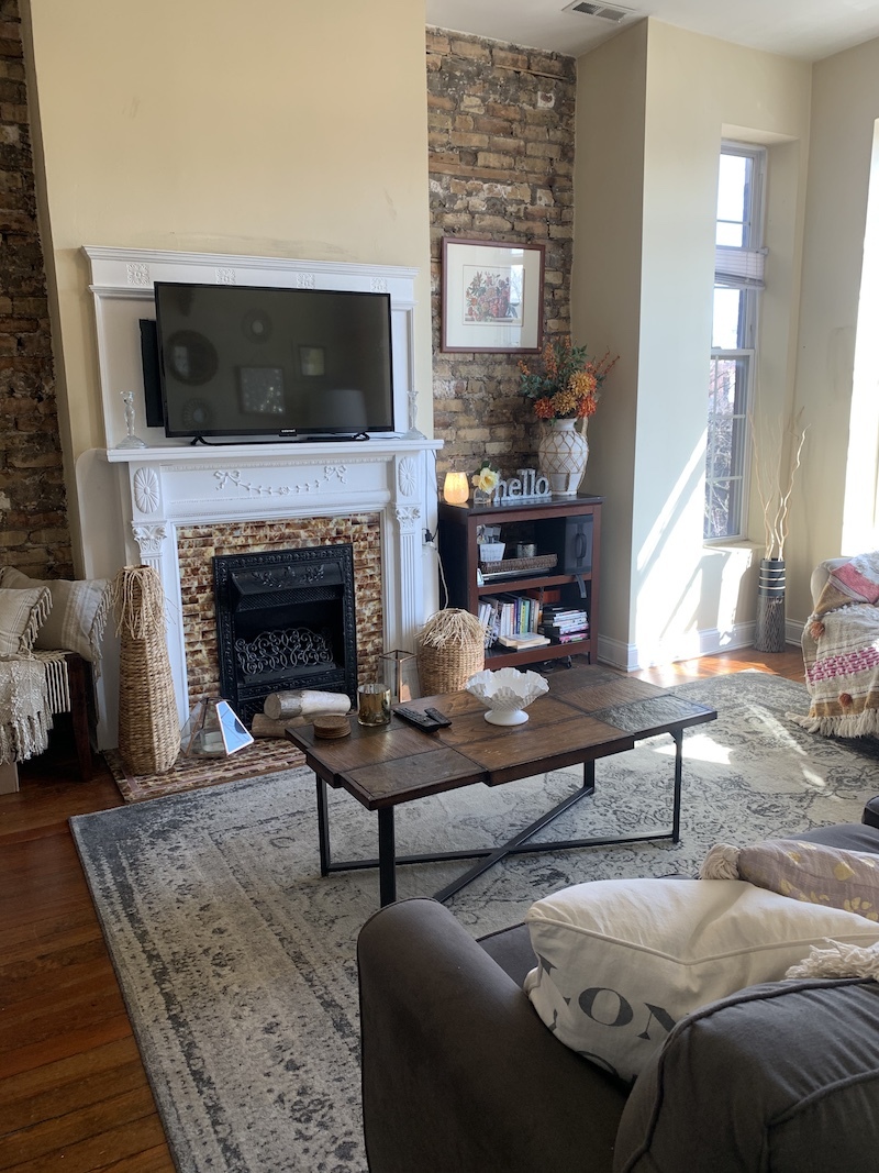 1740 West Huron Street, Unit 3F Chicago, IL 60622 - Photo 3 of 18 a living room with furniture and a fireplace