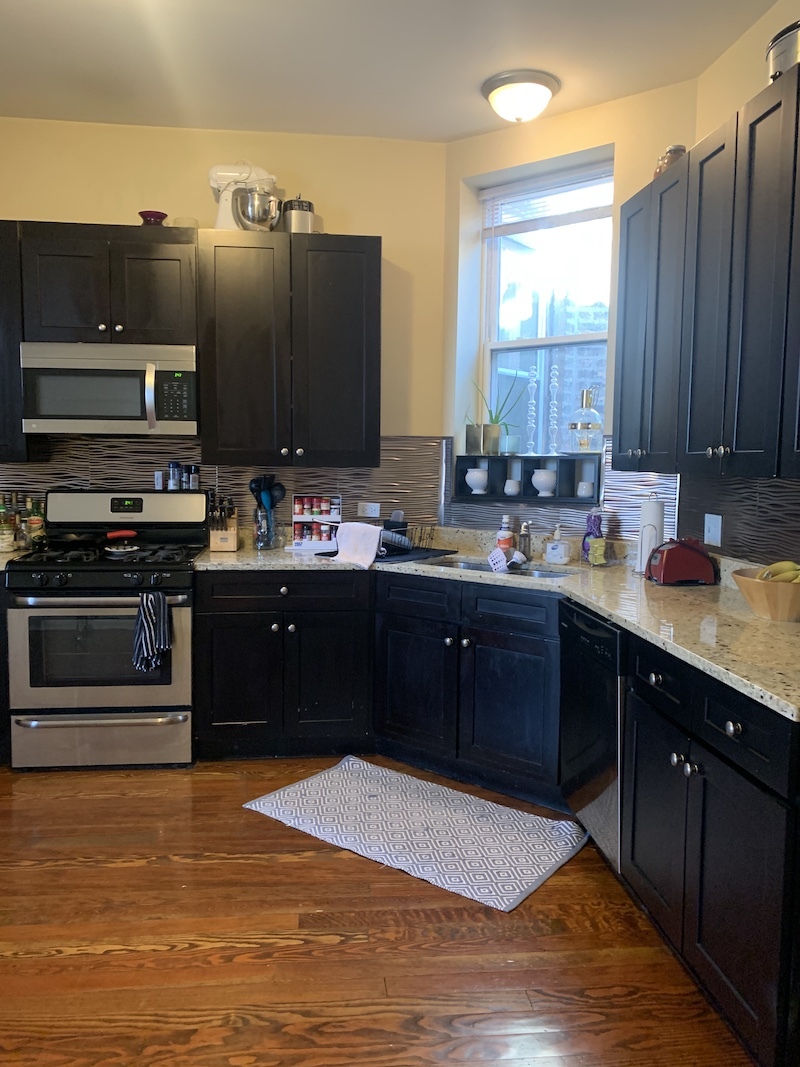 1740 West Huron Street, Unit 3F Chicago, IL 60622 - Photo 8 of 18 a kitchen with a sink and cabinets