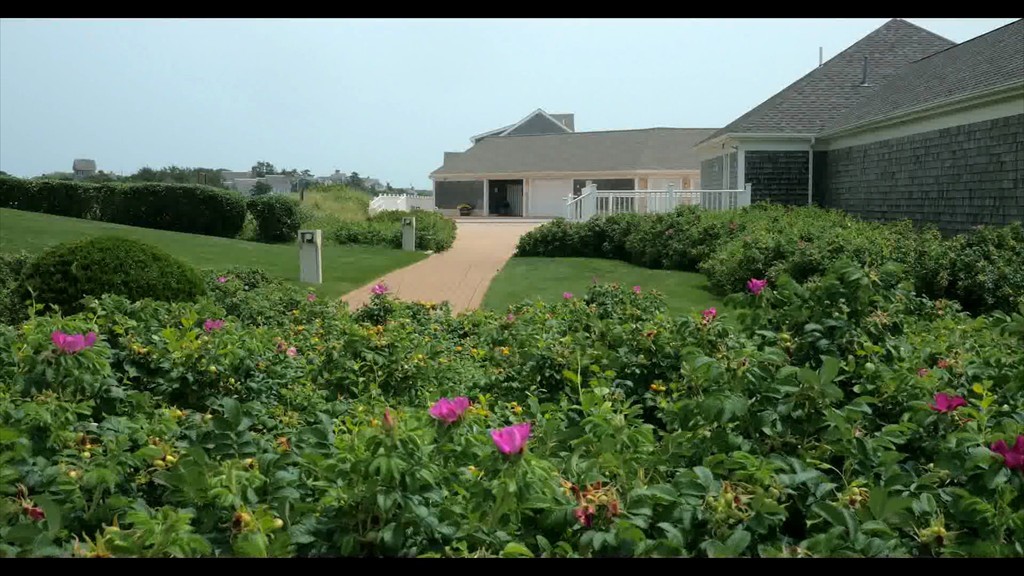 1 Belmont Road, Unit 223 West Harwich, MA 02671 - Photo 20 of 23 a view of a house with big yard and potted plants