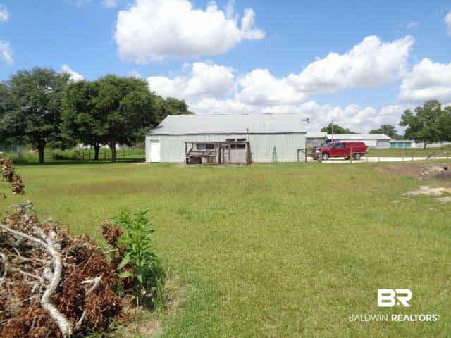 28202 Vargo Lane Elberta, AL 36530 - Photo 43 of 45 Side view of barn/shop from pond area.