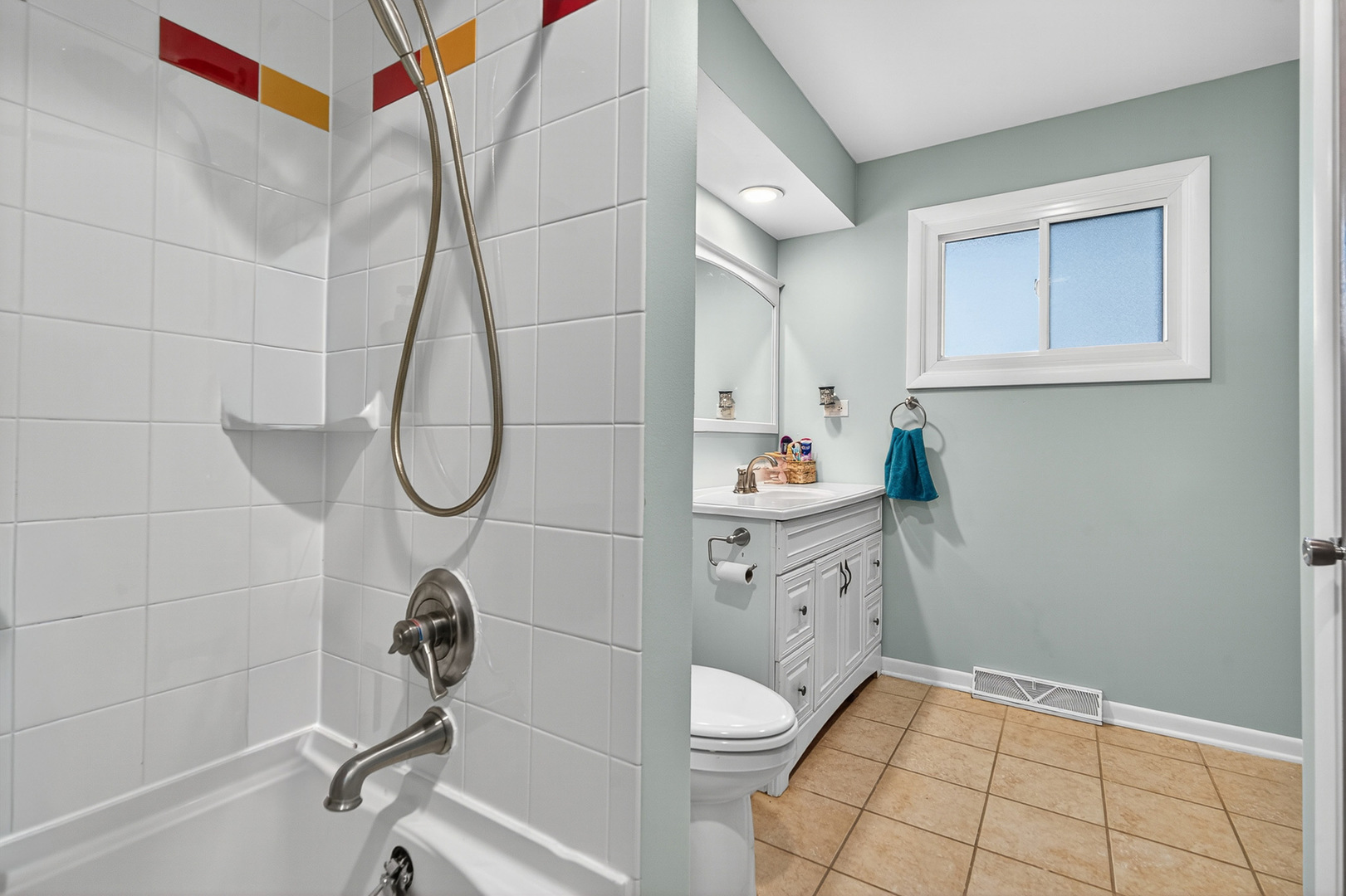185 North Happ Road Northfield, IL 60093 - Photo 15 of 38 a bathroom with a granite countertop sink a toilet and a shower