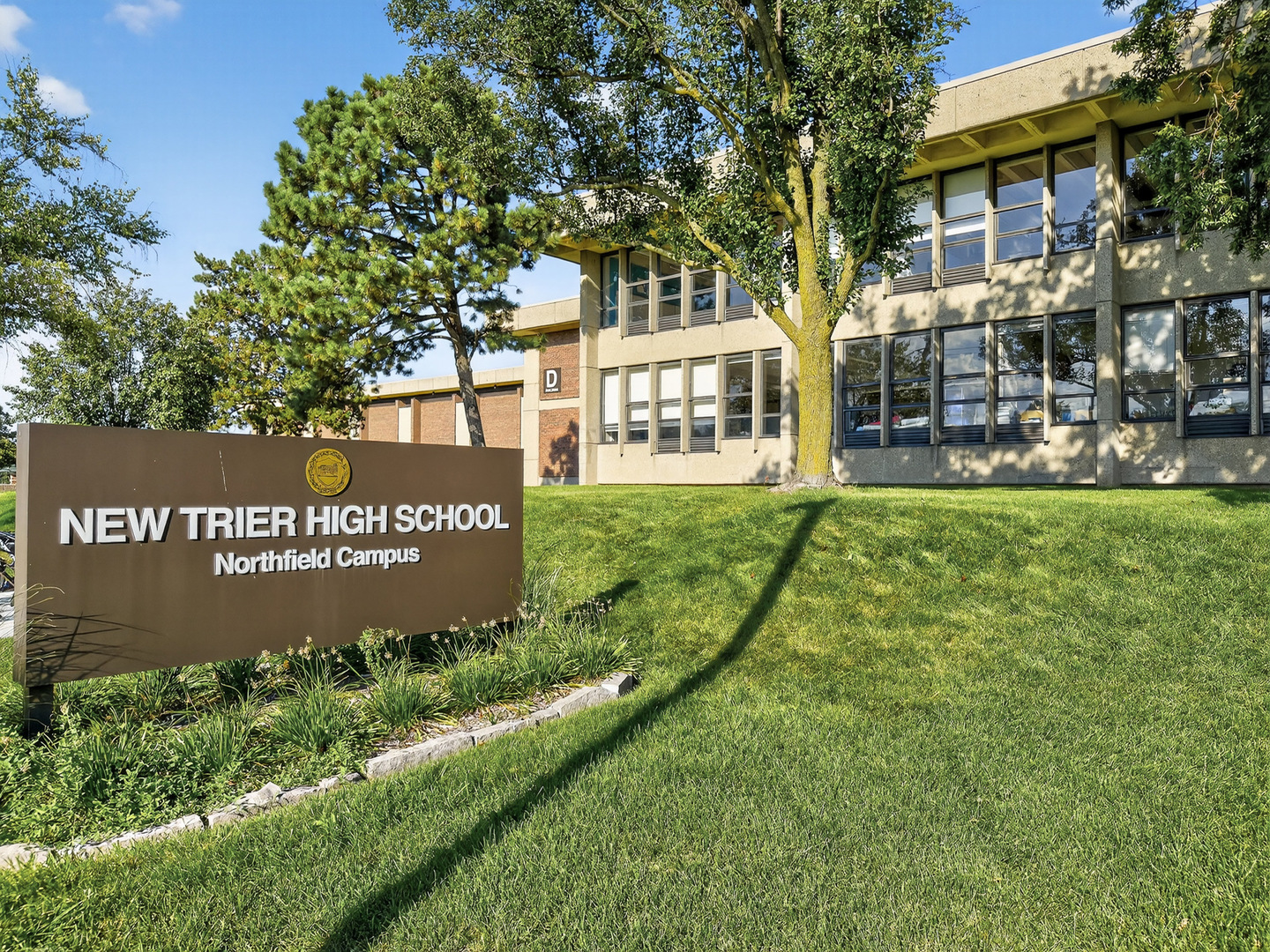 185 North Happ Road Northfield, IL 60093 - Photo 31 of 38 a view of a sign broad in front of red brick house