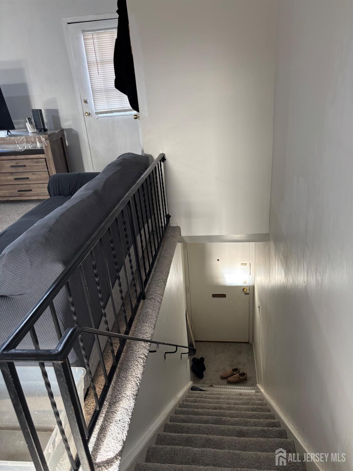 363 Cranbury Road, Unit A16 East Brunswick, NJ 08816 - Photo 3 of 12 a view of an empty room and wooden floor