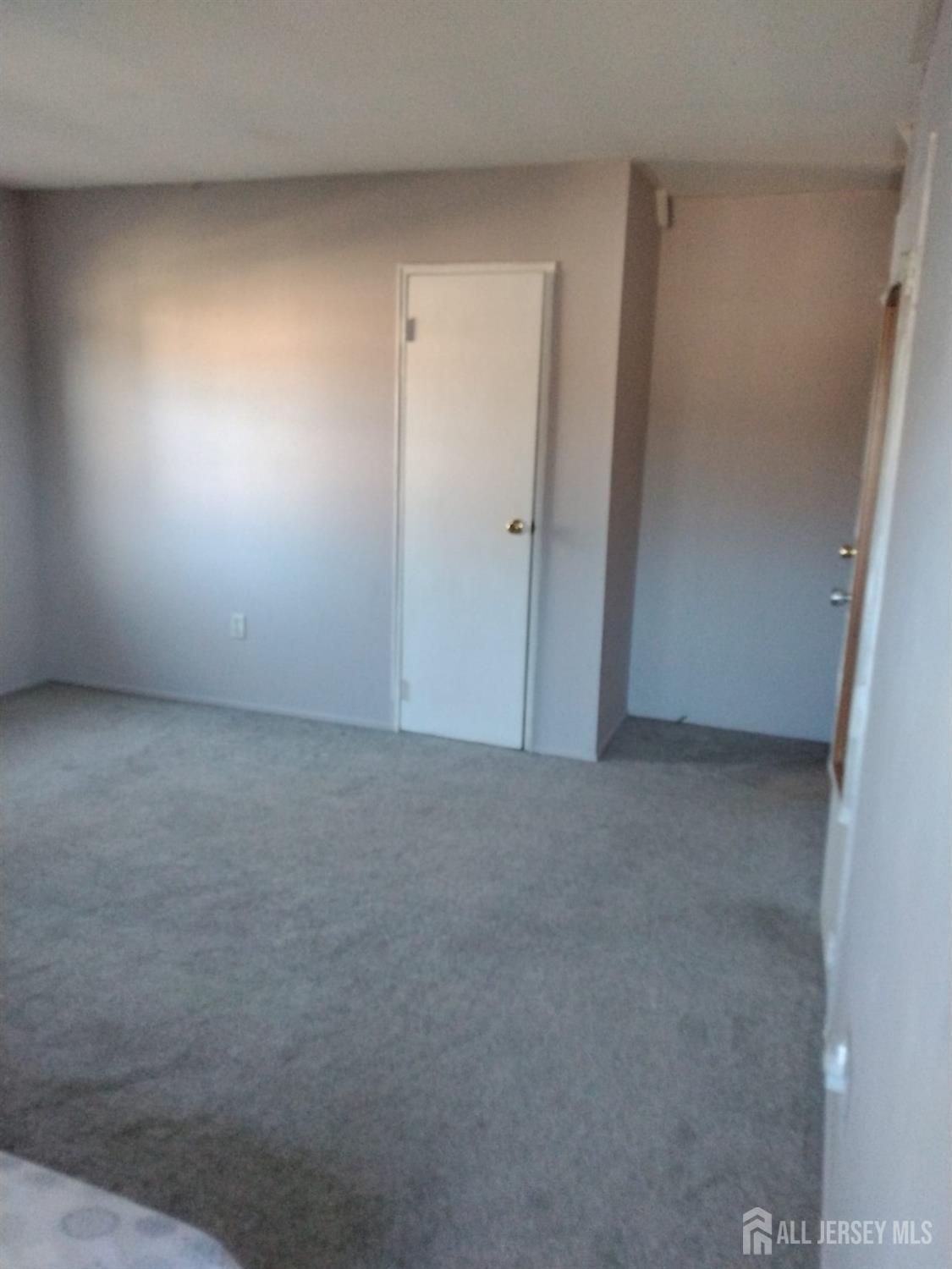 363 Cranbury Road, Unit A16 East Brunswick, NJ 08816 - Photo 7 of 12 a view of an empty room