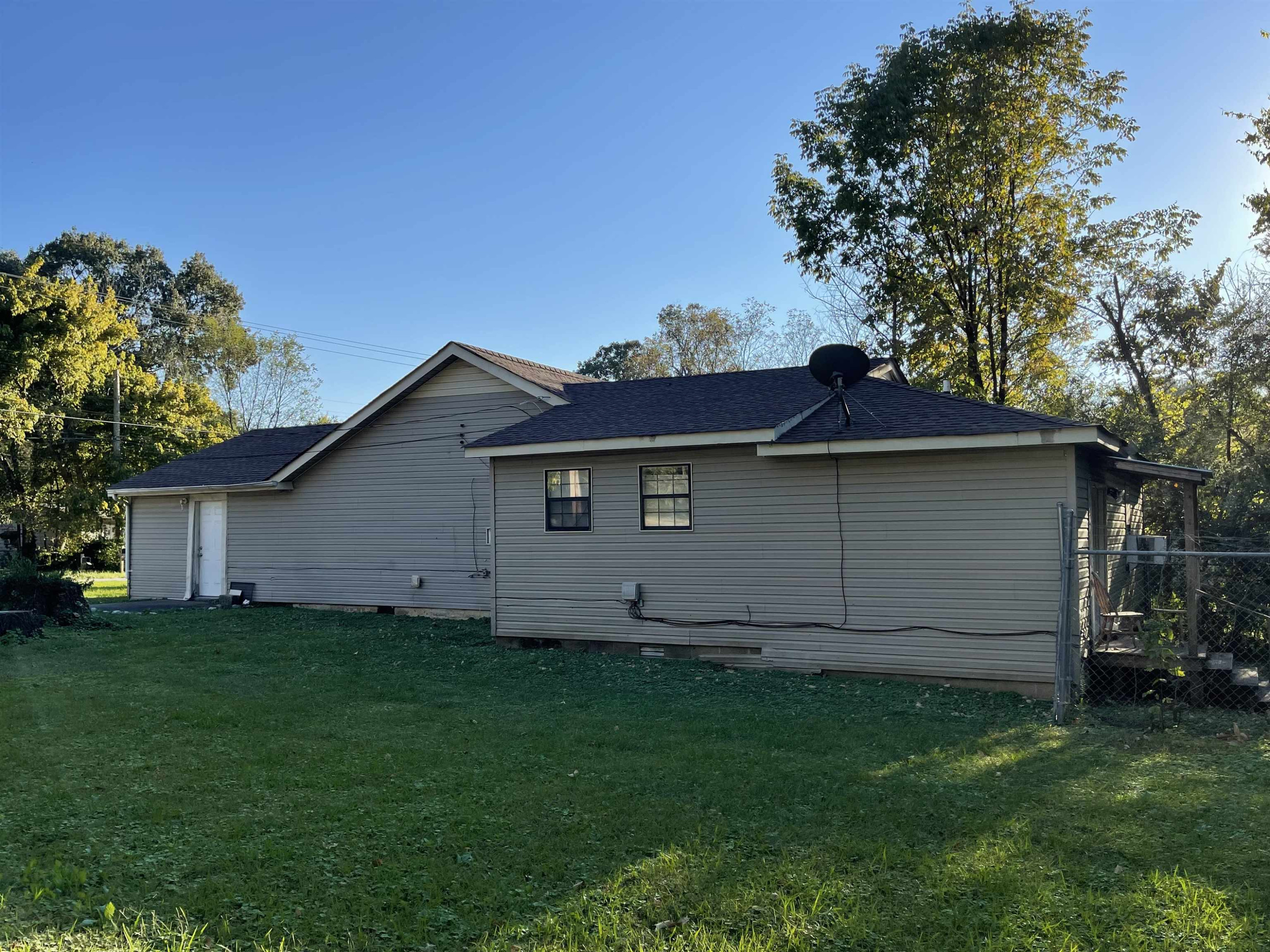 195 Old Denmark Road Jackson, TN 38301 - Photo 10 of 10 a view of a backyard with a small cabin
