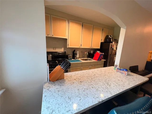 a bedroom with a bed and dresser