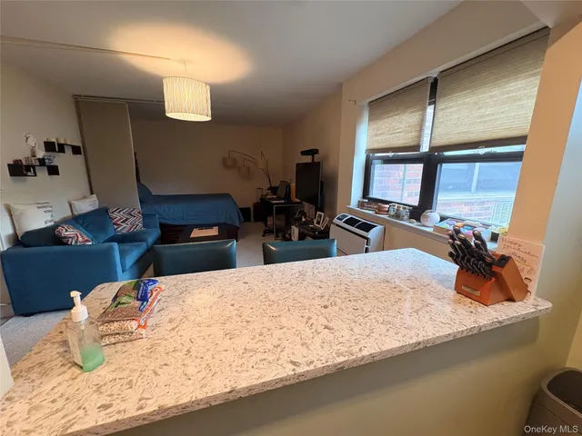 a bed room with a bed and dresser