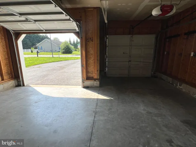 a view of a porch with wooden floor and a porch