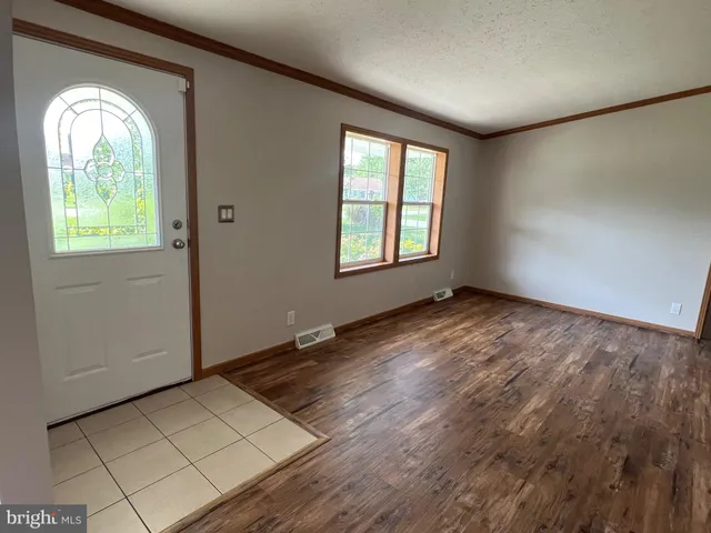 an empty room with windows