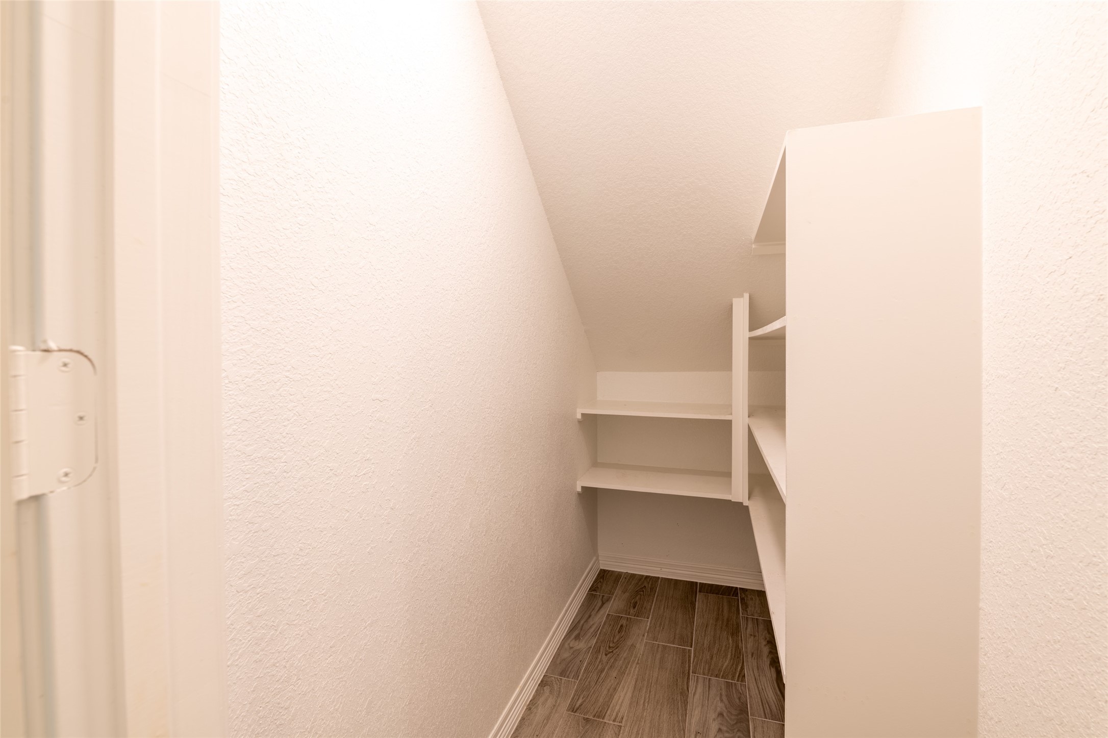 25012 Armagh Road Hempstead, TX 77445 - Photo 14 of 33 a view of small space with racks on the wall