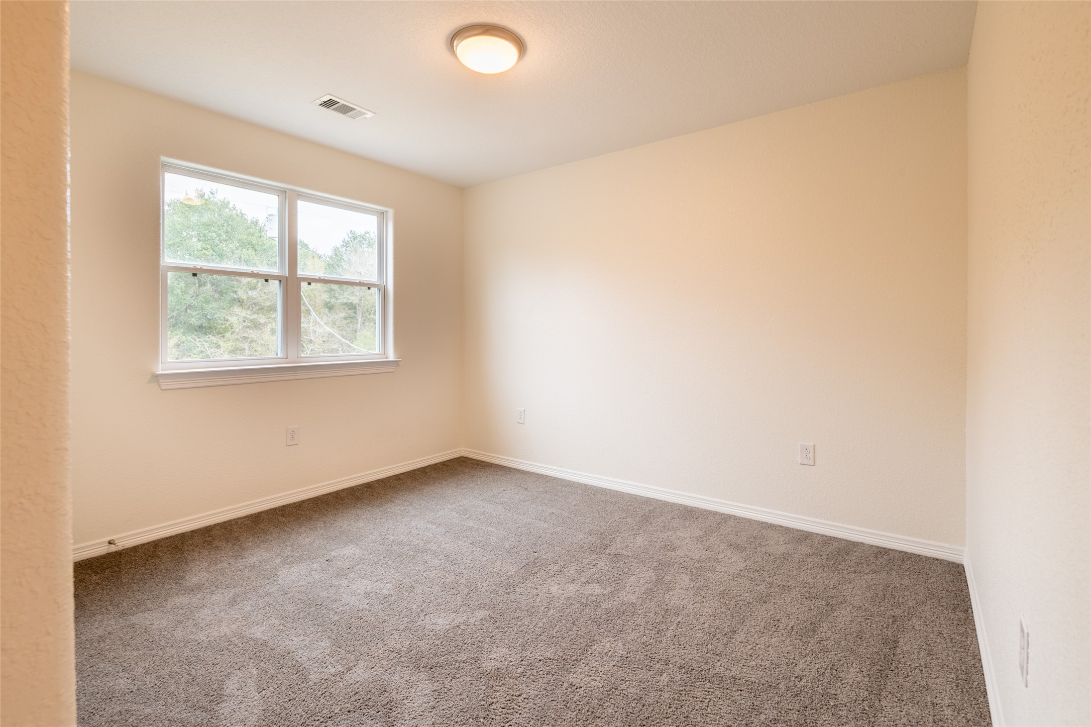 25012 Armagh Road Hempstead, TX 77445 - Photo 23 of 33 an empty room with a window