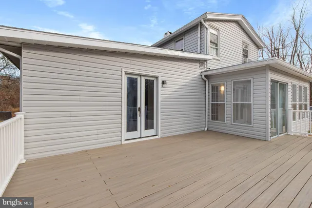 a bathroom with a bathtub and sink