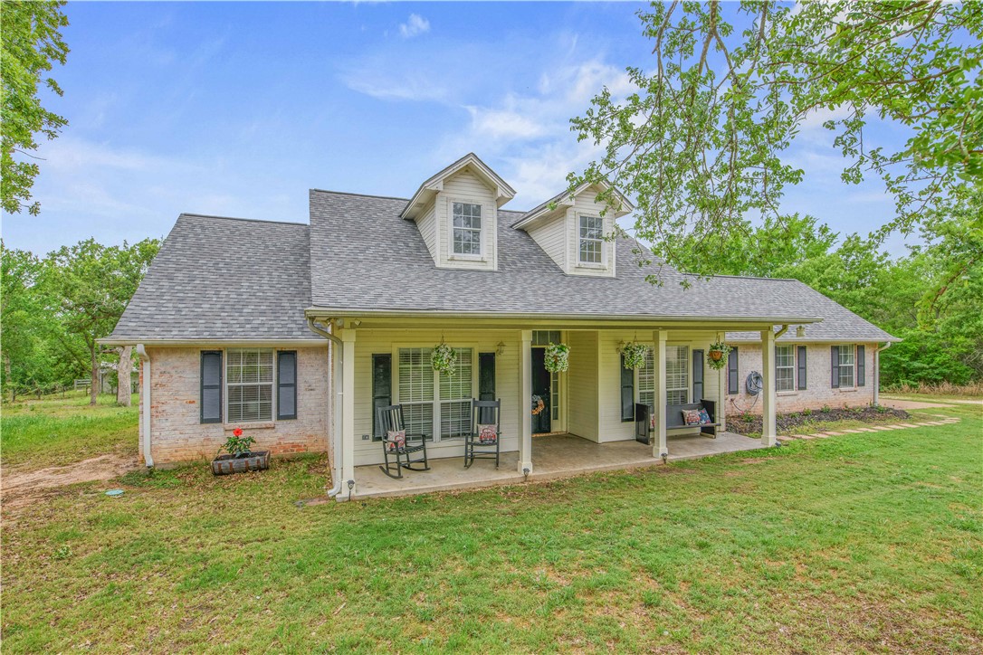6538 Olympia Buddy Road College Station, TX 77845 - Photo 3 of 50 front view of a house with a yard