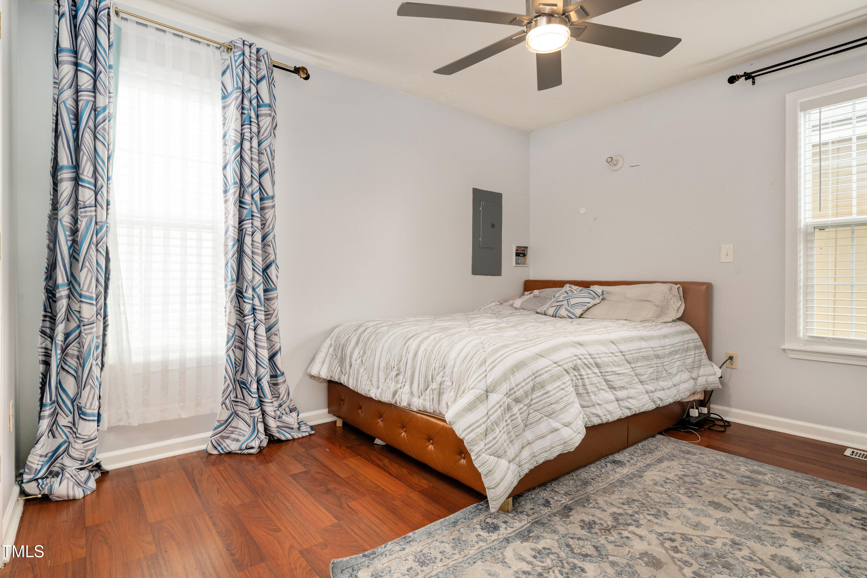 4809 Hallam Way Raleigh, NC 27616 - Photo 13 of 30 a bedroom with a bed and a window