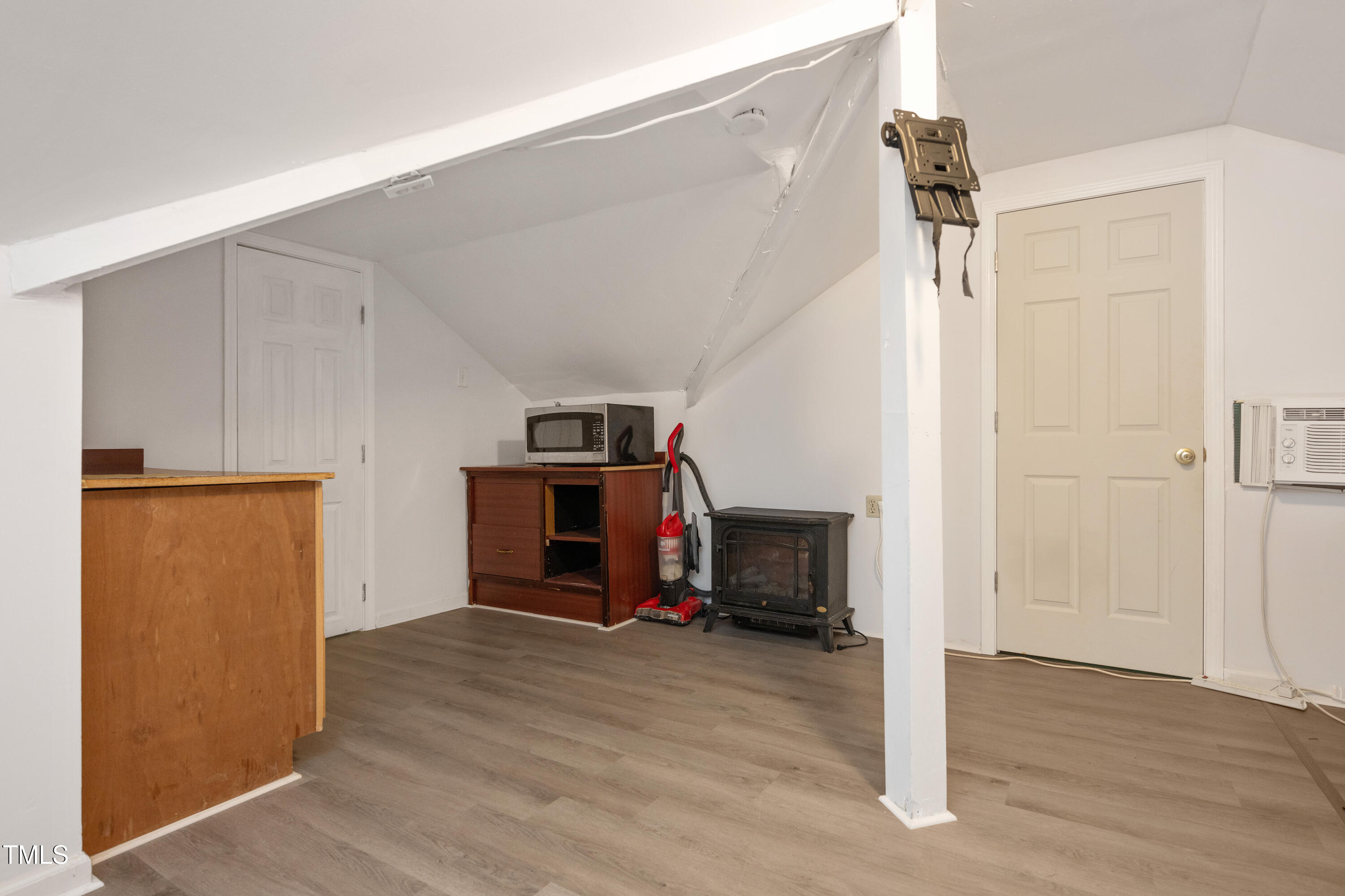 4809 Hallam Way Raleigh, NC 27616 - Photo 24 of 30 a view of a livingroom with wooden floor and furniture