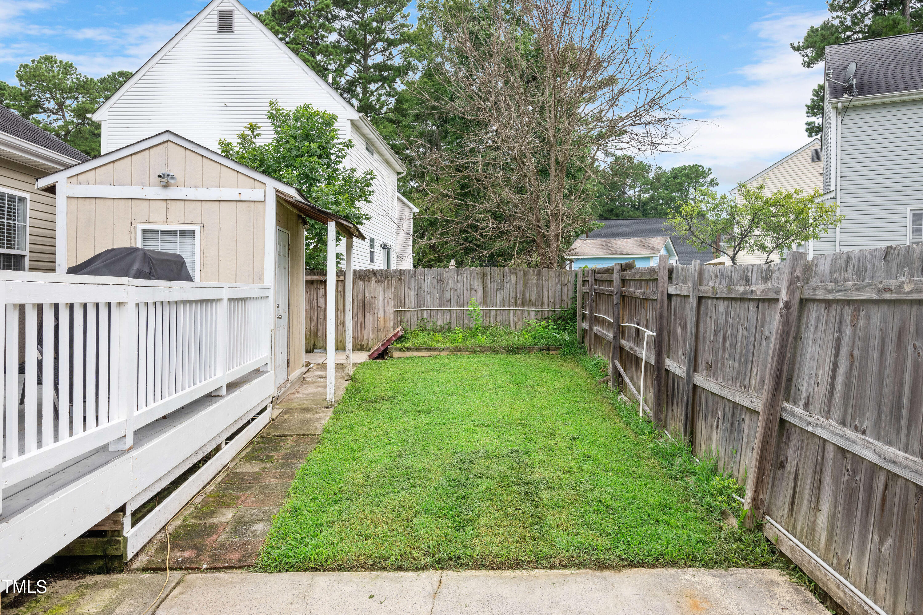 4809 Hallam Way Raleigh, NC 27616 - Photo 28 of 30 a view of a house with backyard and porch
