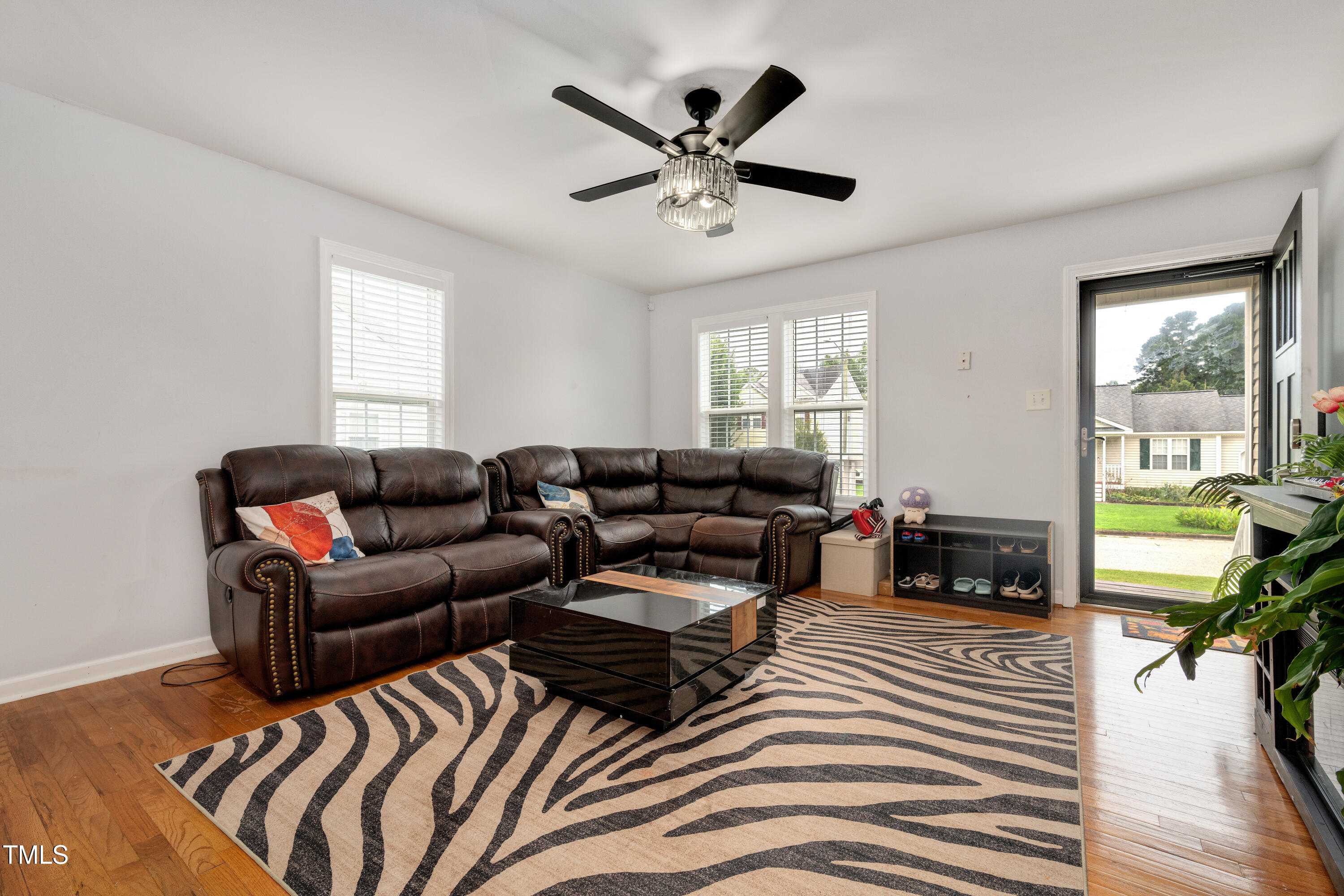 4809 Hallam Way Raleigh, NC 27616 - Photo 3 of 30 a living room with furniture and a large window