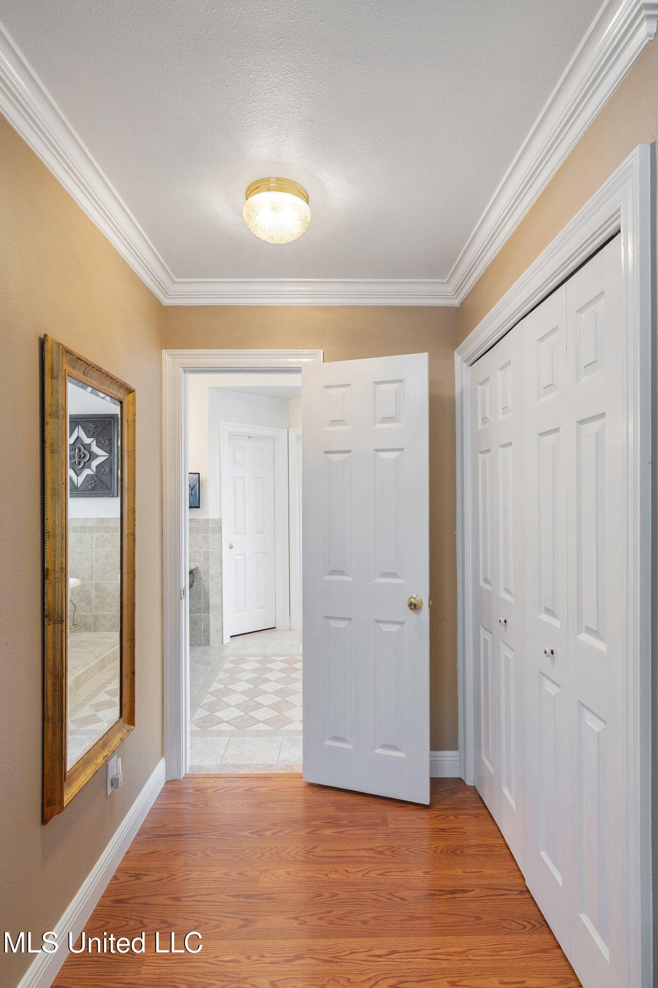 18029 Commission Road Long Beach, MS 39560 - Photo 15 of 34 Primary bedroom closet