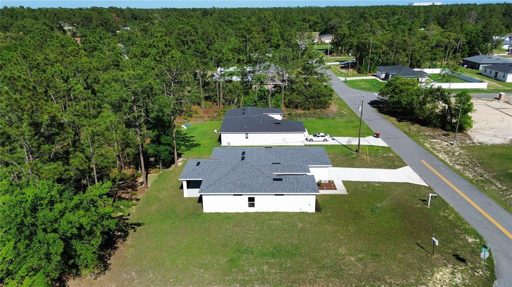 7191 Southwest 133rd Lane Ocala, FL 34473 - Photo 4 of 20 an aerial view of a house