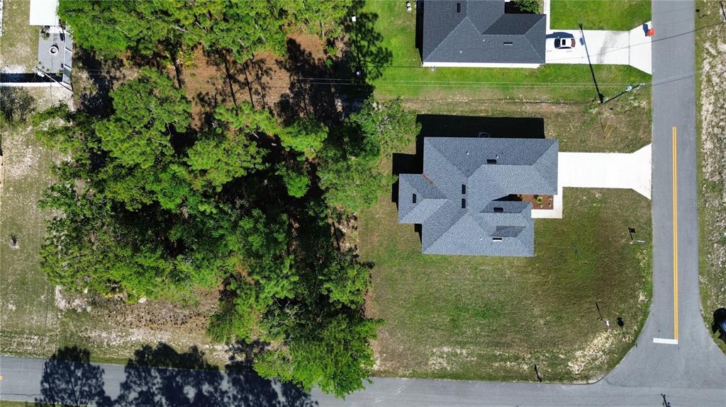 7191 Southwest 133rd Lane Ocala, FL 34473 - Photo 5 of 20 an aerial view of a house with a yard