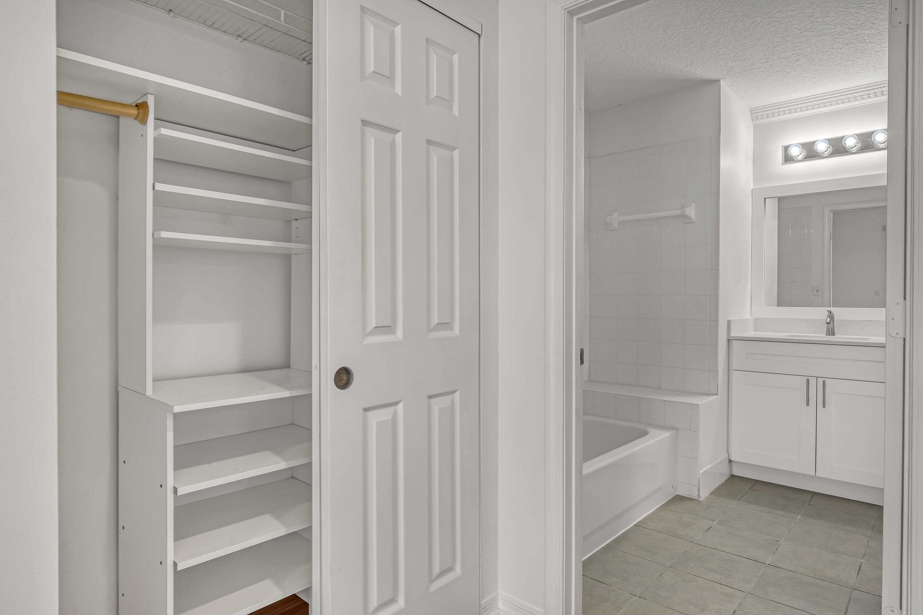 1155 Main Street, Unit 219 Jupiter, FL 33458 - Photo 12 of 25 master closet and bathroom