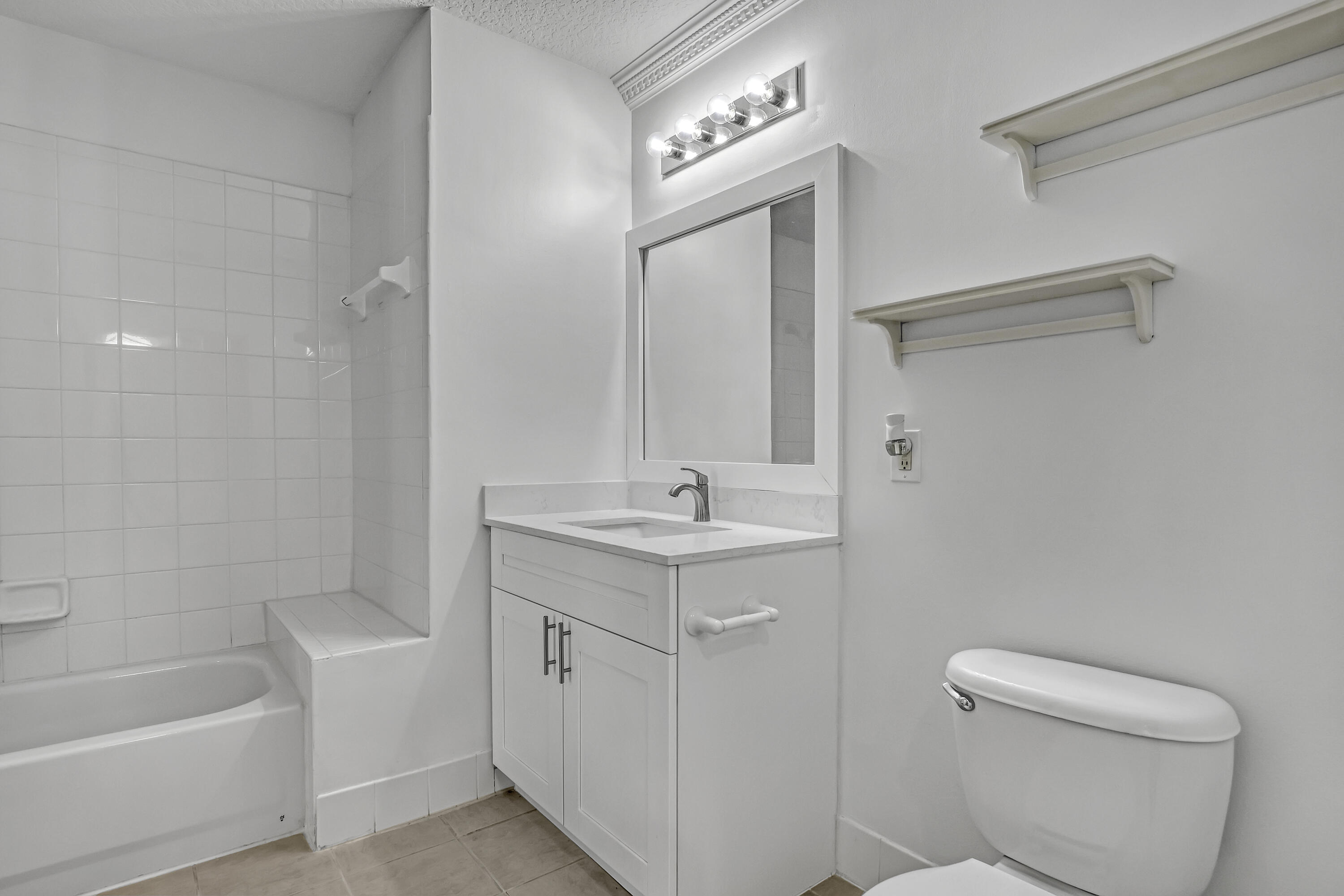 1155 Main Street, Unit 219 Jupiter, FL 33458 - Photo 13 of 25 master bathroom view 1