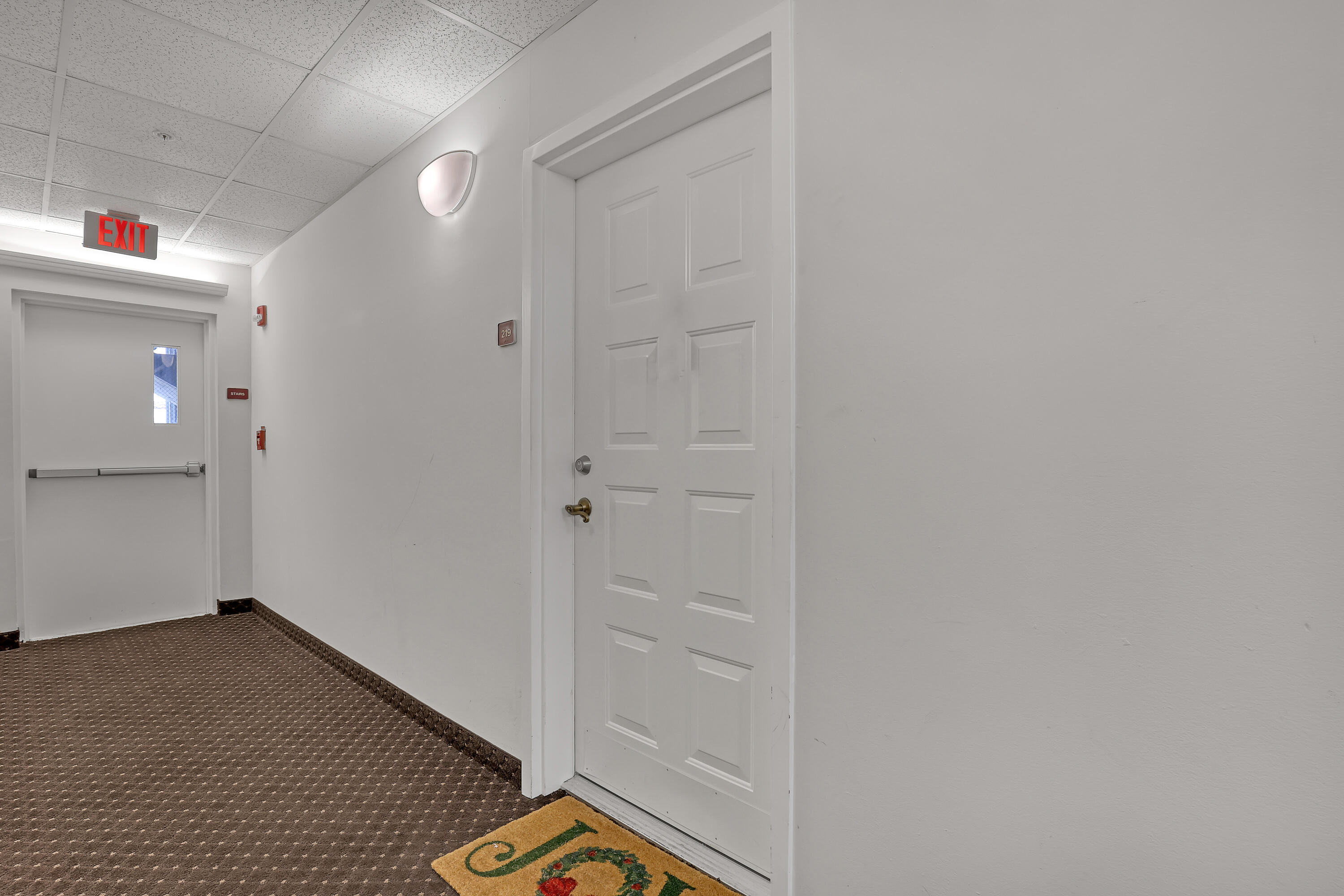 1155 Main Street, Unit 219 Jupiter, FL 33458 - Photo 2 of 25 front door