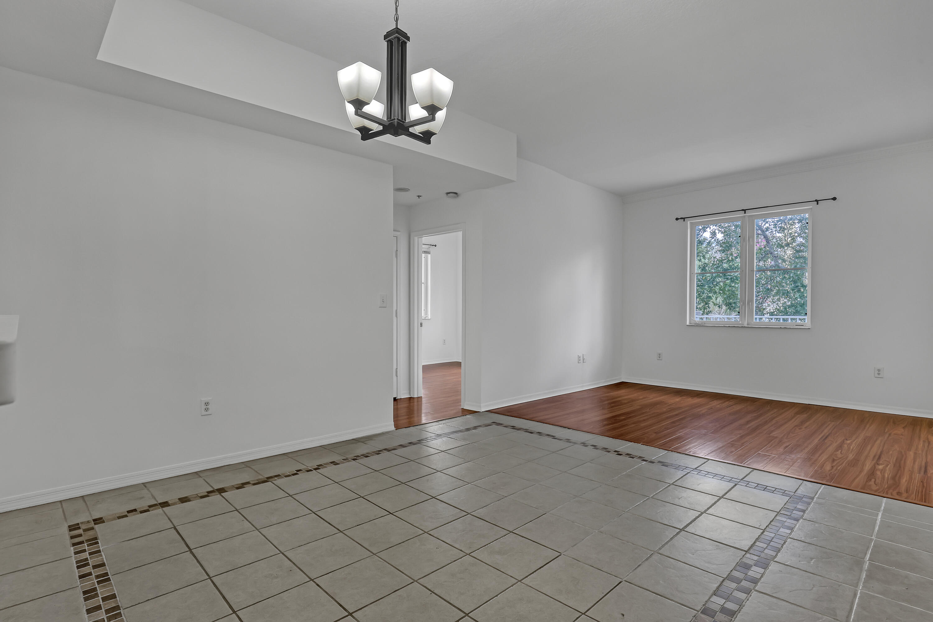 1155 Main Street, Unit 219 Jupiter, FL 33458 - Photo 6 of 25 dining area and living area