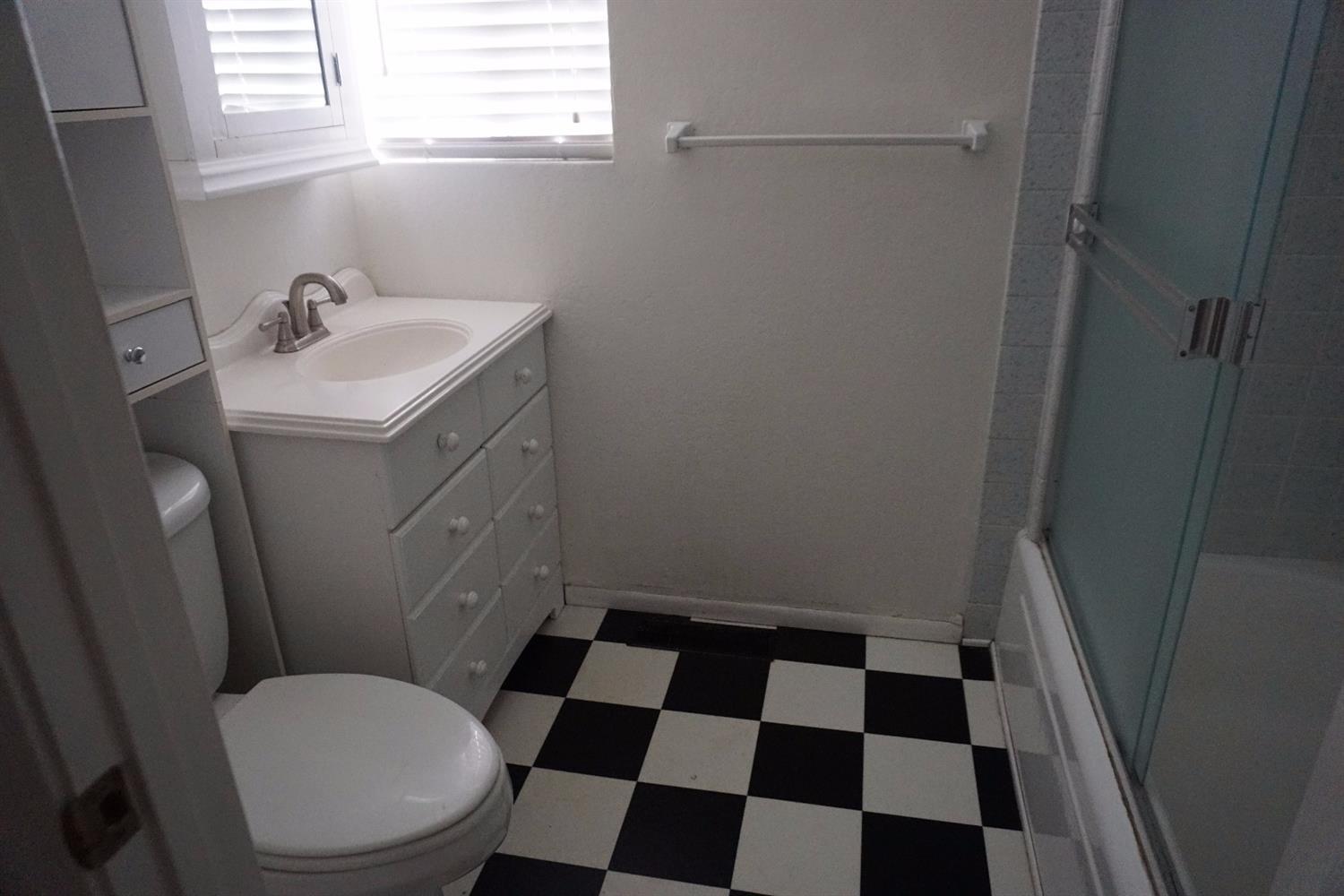 1312 Talent Avenue Talent, OR 97540 - Photo 14 of 21 a bathroom with a sink and a toilet