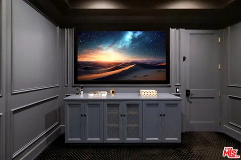 a view of a house with pool and chairs