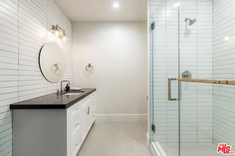 a view of swimming pool with seating area