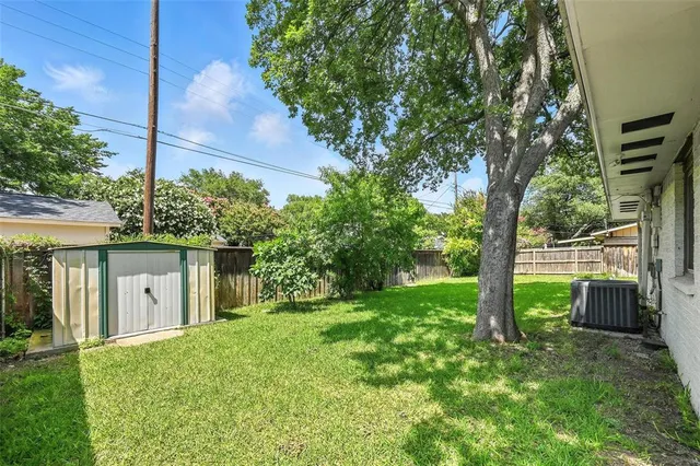 a backyard of a house with seating space