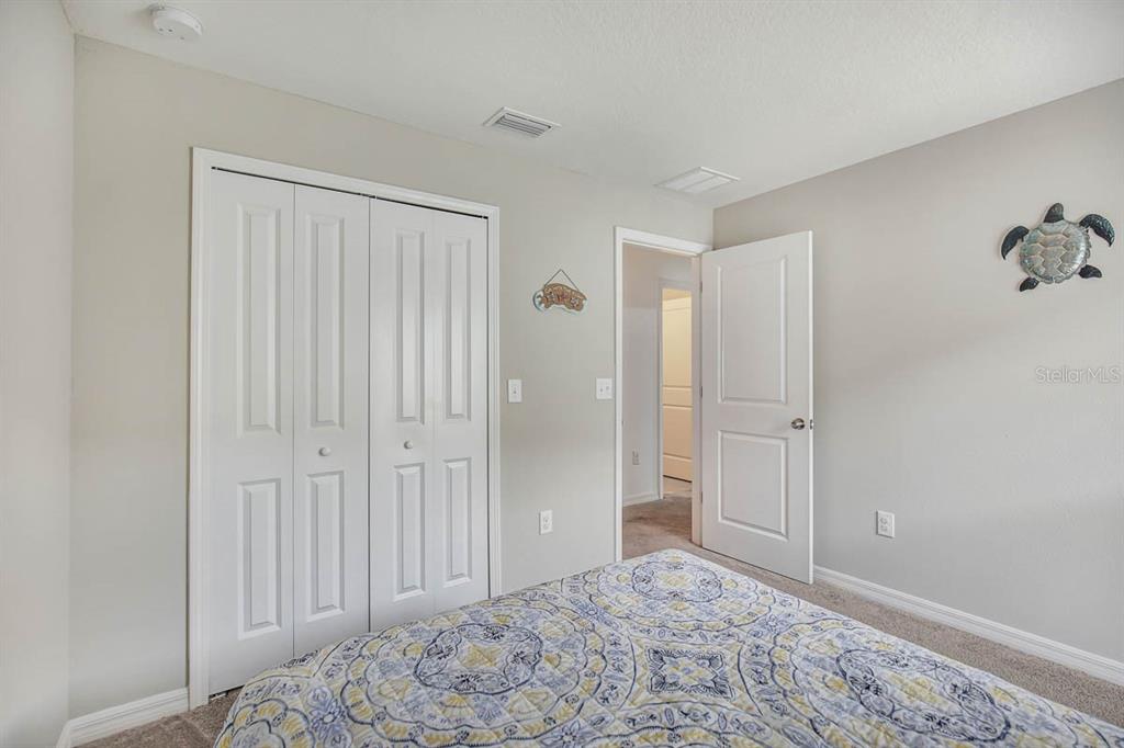 12618 Sandpine Reserve Place Gibsonton, FL 33534 - Photo 20 of 28 a view of a bedroom