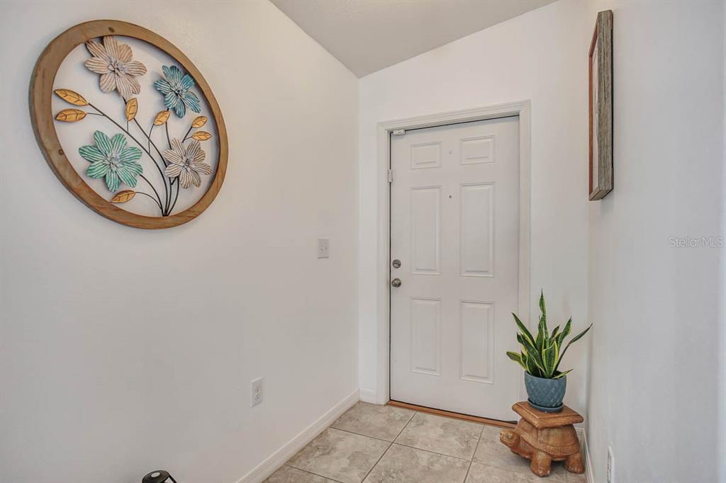 12618 Sandpine Reserve Place Gibsonton, FL 33534 - Photo 4 of 28 a view of a hallway with elevator