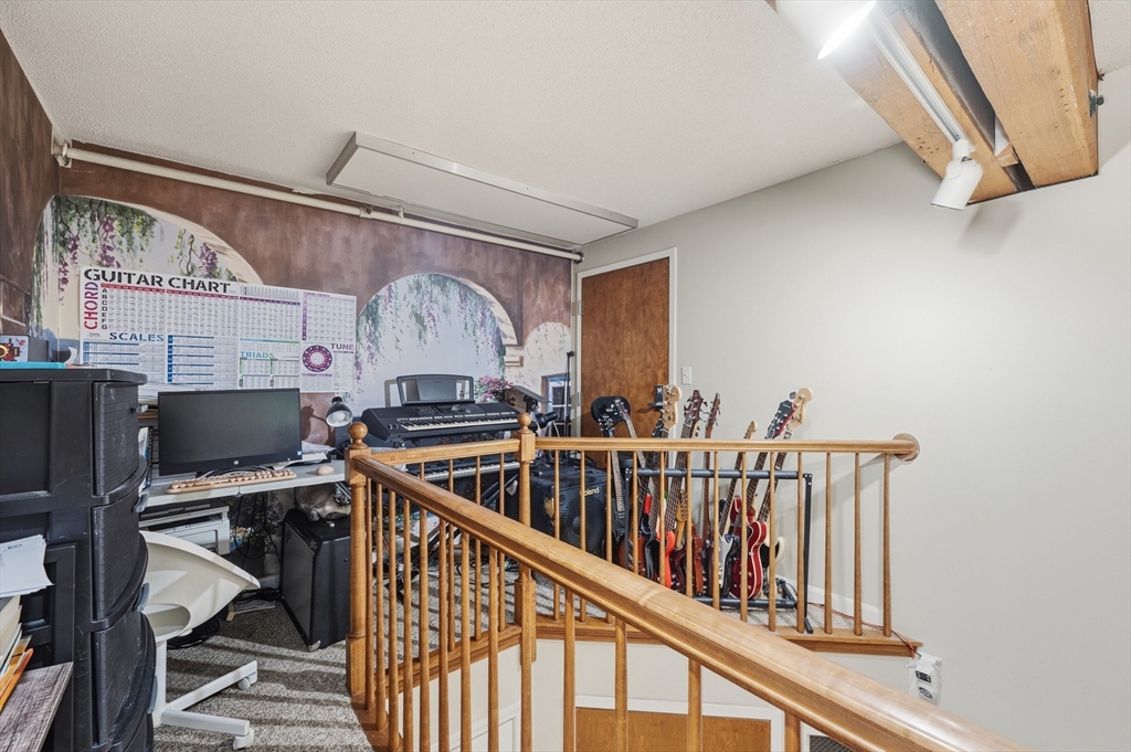 200 Market Street, Unit 217 Lowell, MA 01852 - Photo 16 of 38 a view of entryway with workspace and bedroom