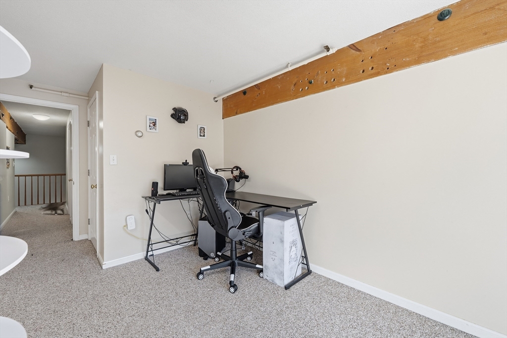 200 Market Street, Unit 217 Lowell, MA 01852 - Photo 21 of 38 a view of workspace with a window