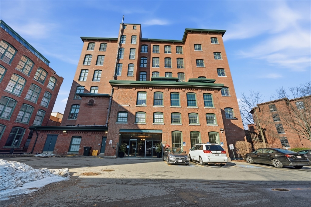 200 Market Street, Unit 217 Lowell, MA 01852 - Photo 31 of 38 a front view of a building with street