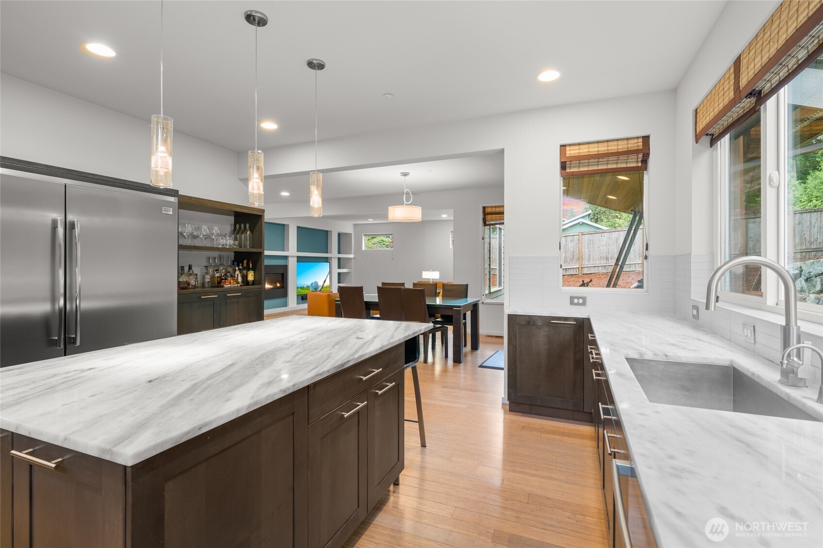 22326 2nd Place Southeast Bothell, WA 98021 - Photo 11 of 40 a large kitchen with kitchen island a large counter top