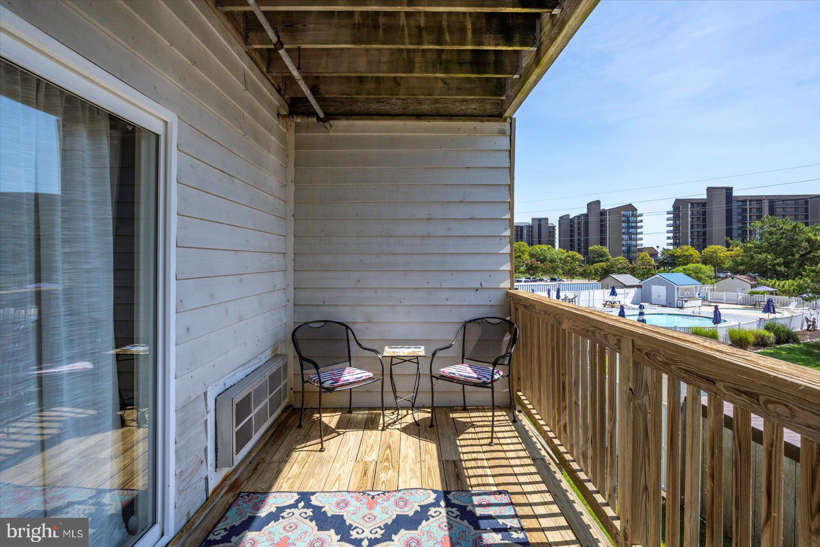 39634 Jefferson Bridge Road, Unit 104 Bethany Beach, DE 19930 - Photo 20 of 28 a view of balcony with furniture