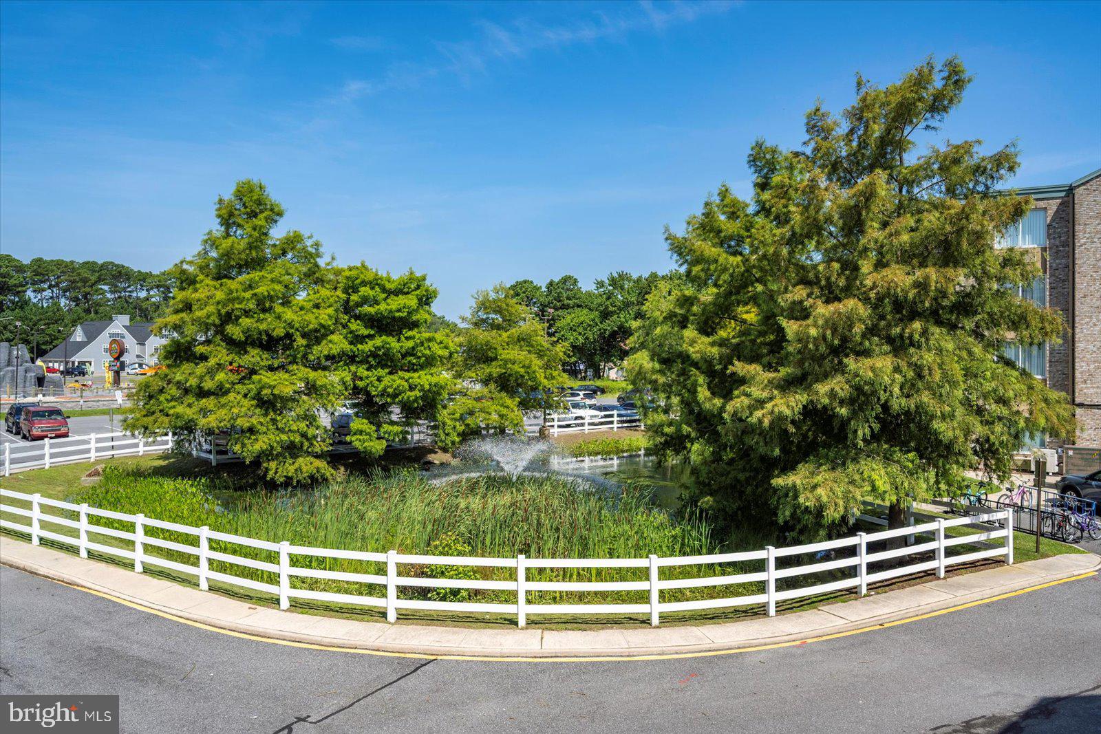 39634 Jefferson Bridge Road, Unit 104 Bethany Beach, DE 19930 - Photo 21 of 28 a view of a tennis court