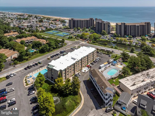 an aerial view of a house with a garden