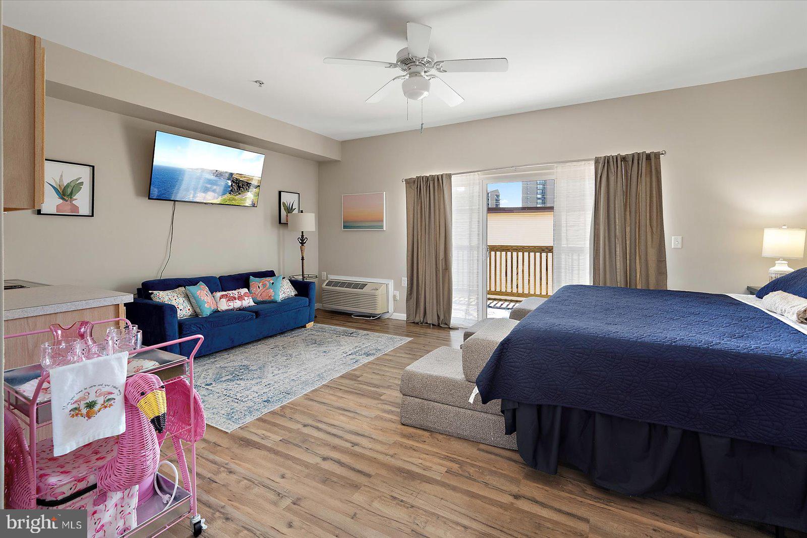 39634 Jefferson Bridge Road, Unit 104 Bethany Beach, DE 19930 - Photo 6 of 28 a bed room with a bed and a window