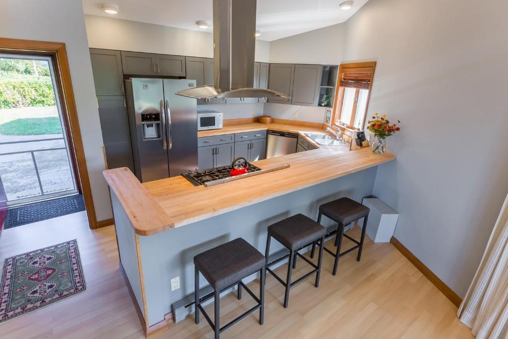 532 Black Point Road Scarborough, ME 04074 - Photo 11 of 21 A sleek modern kitchen offers...