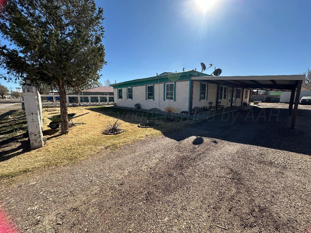 403 Rector Avenue Cactus, TX 79013 - Photo 3 of 3 a view of a house with backyard and sitting area