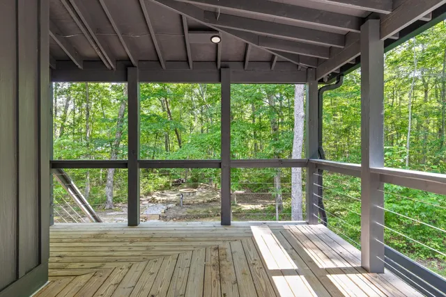 a view of porch with wooden floor in outdoor space