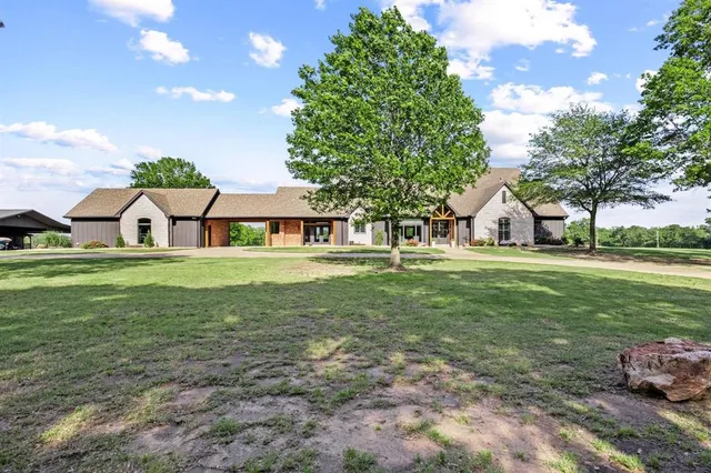 a view of a house with garden