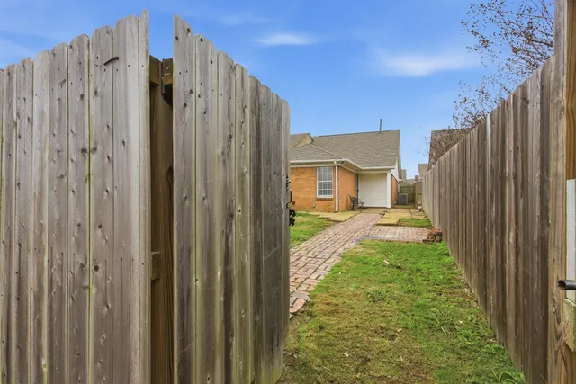 a view of a back yard from a backyard